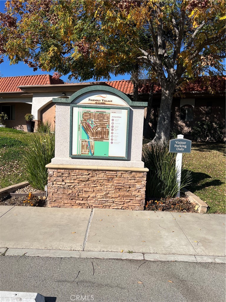1001 West Lambert Road, Unit 284 La Habra, CA 90631 - Photo 20 of 28 a front view of a house with a yard