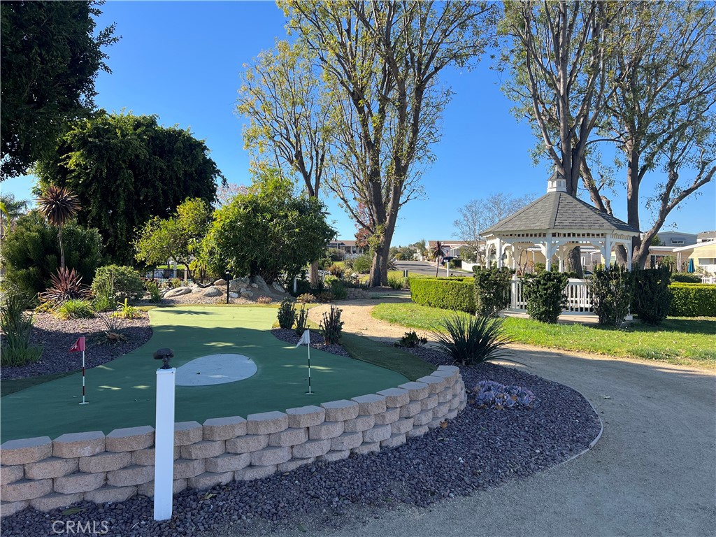 1001 West Lambert Road, Unit 284 La Habra, CA 90631 - Photo 22 of 28 a view of a swimming pool with a yard and plants