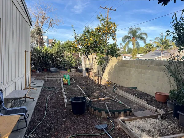 a view of yard with outdoor seating