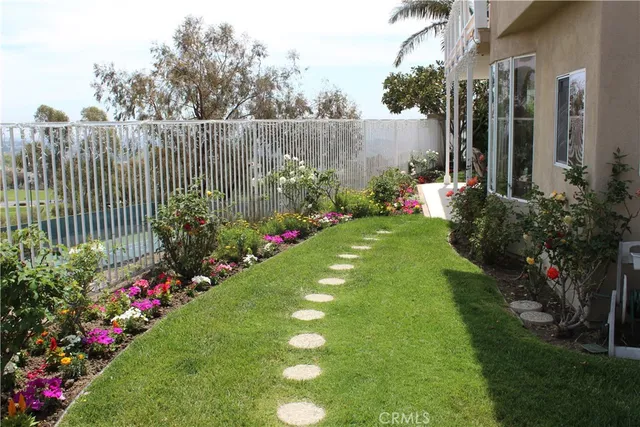 a view of a garden with flowers