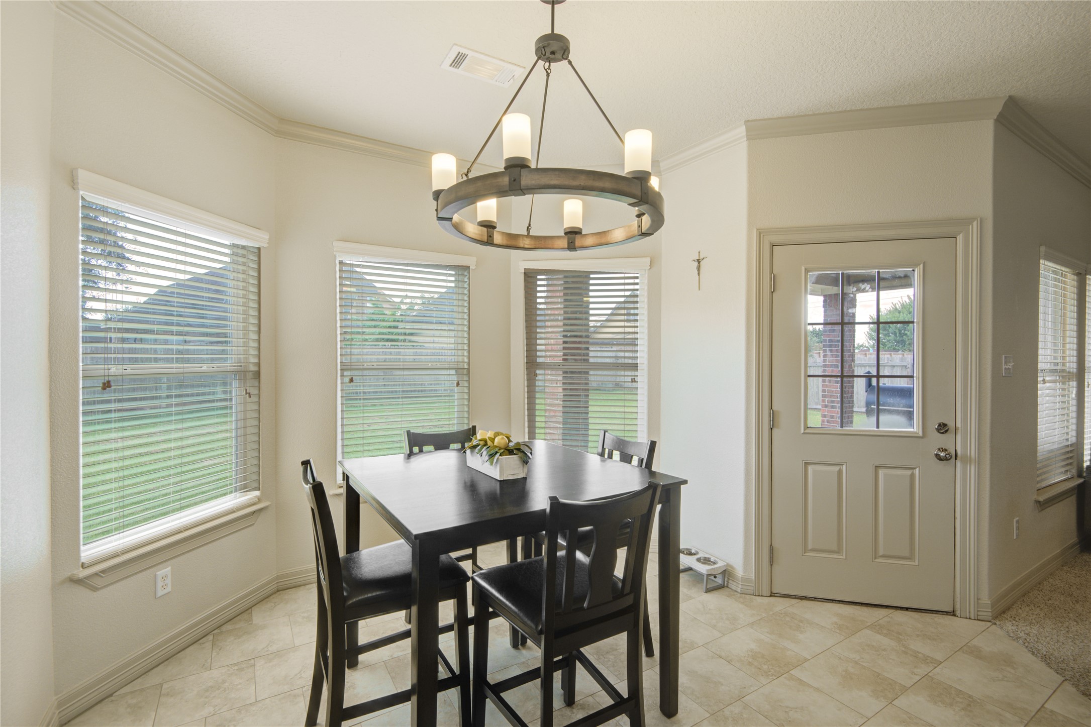 57 Red Maple Court Lake Jackson, TX 77566 - Photo 14 of 44 a view of a dining room with furniture window and outside view