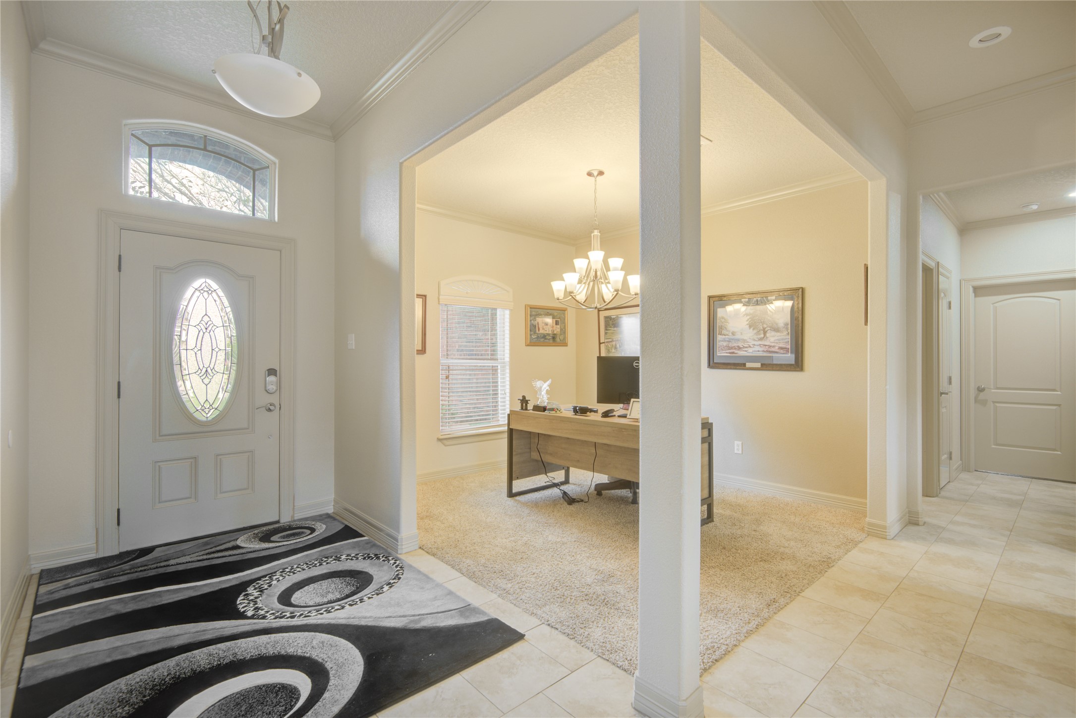 57 Red Maple Court Lake Jackson, TX 77566 - Photo 25 of 44 a view of a hallway with entryway wooden floor and front door