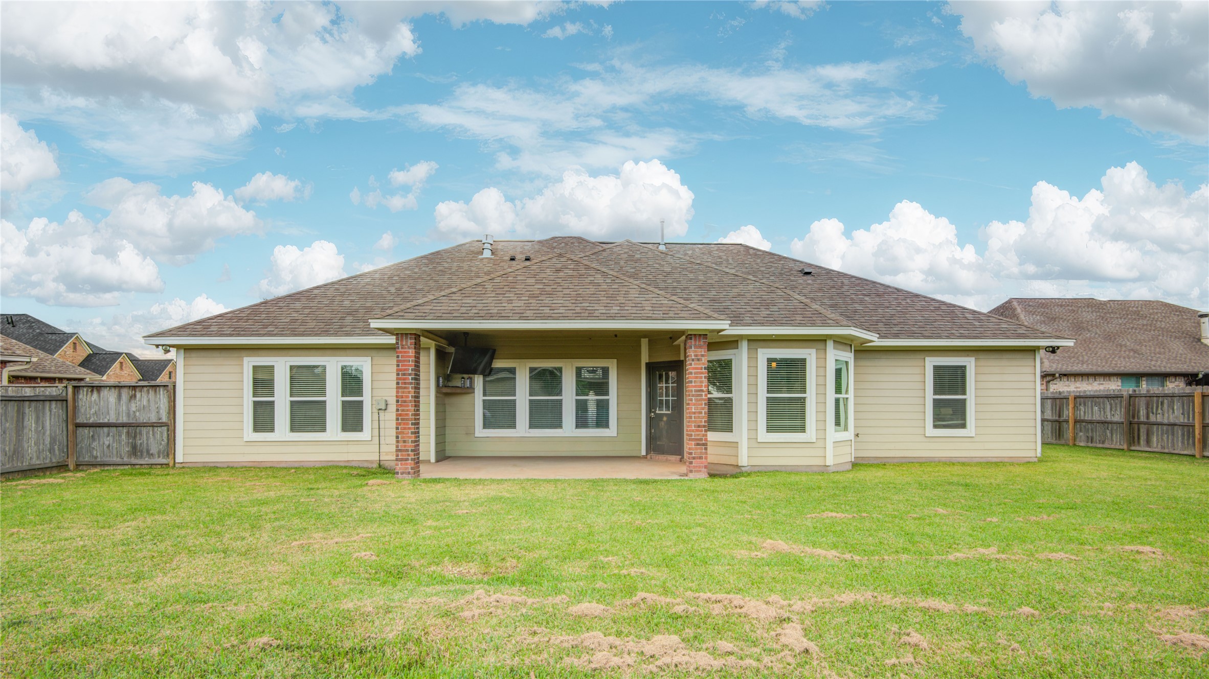 57 Red Maple Court Lake Jackson, TX 77566 - Photo 40 of 44 a view of a house with a backyard