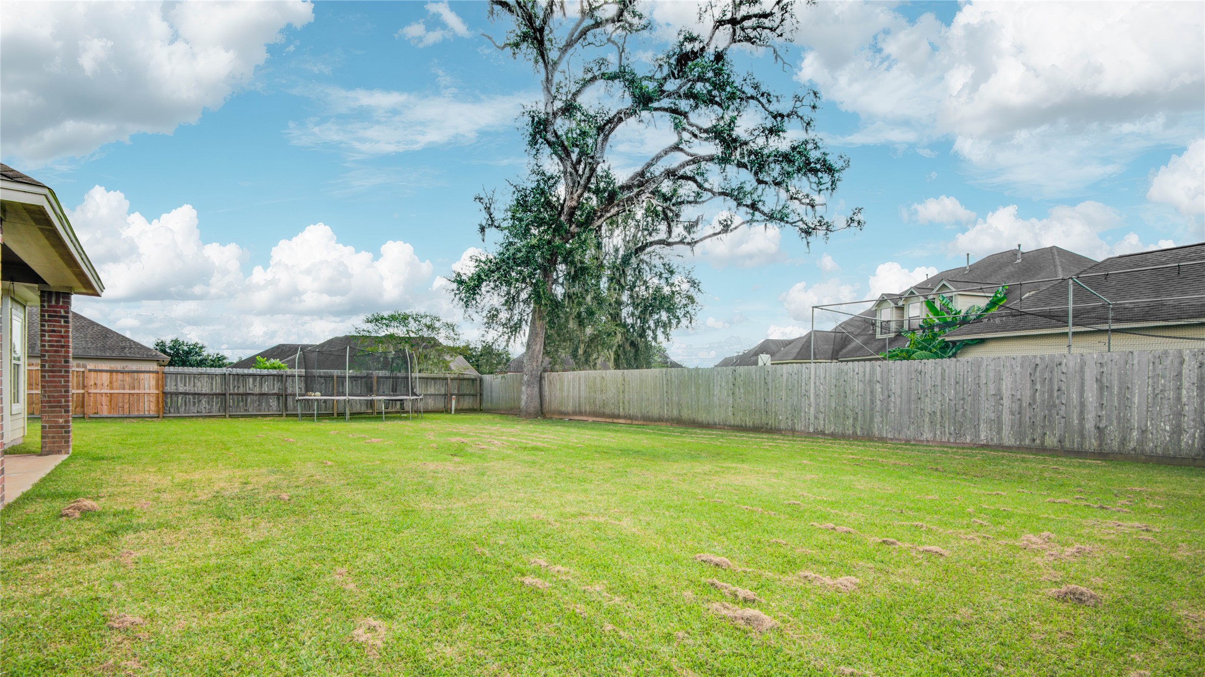 57 Red Maple Court Lake Jackson, TX 77566 - Photo 42 of 44 a view of a back yard