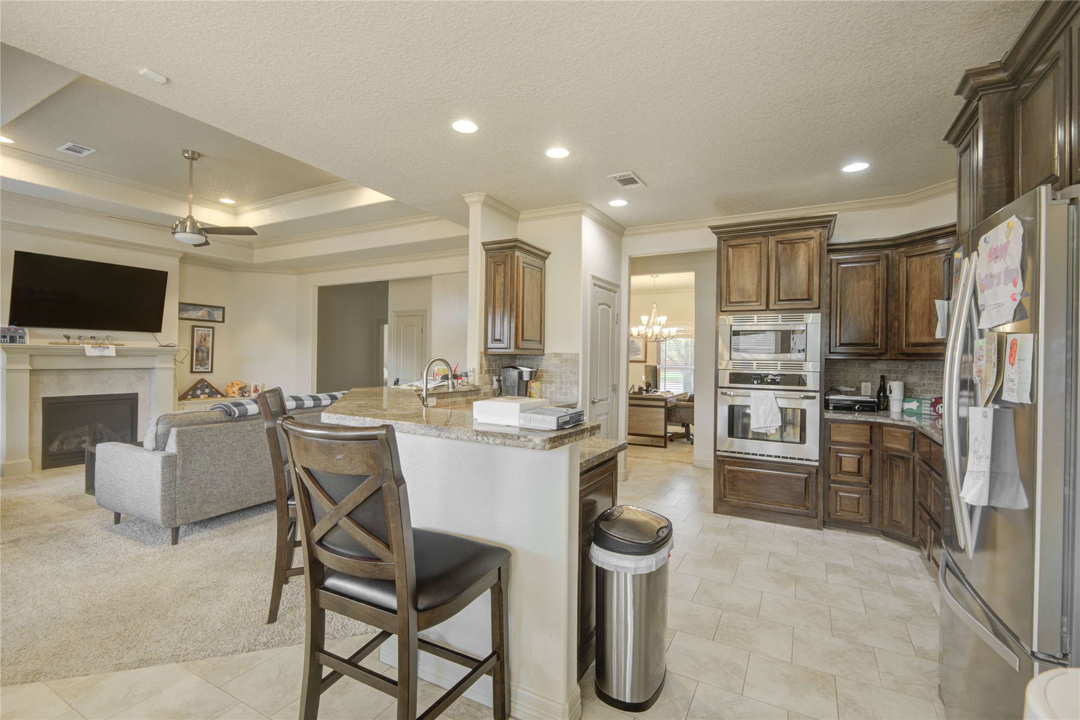 57 Red Maple Court Lake Jackson, TX 77566 - Photo 10 of 44 a kitchen with cabinets a sink and stainless steel appliances