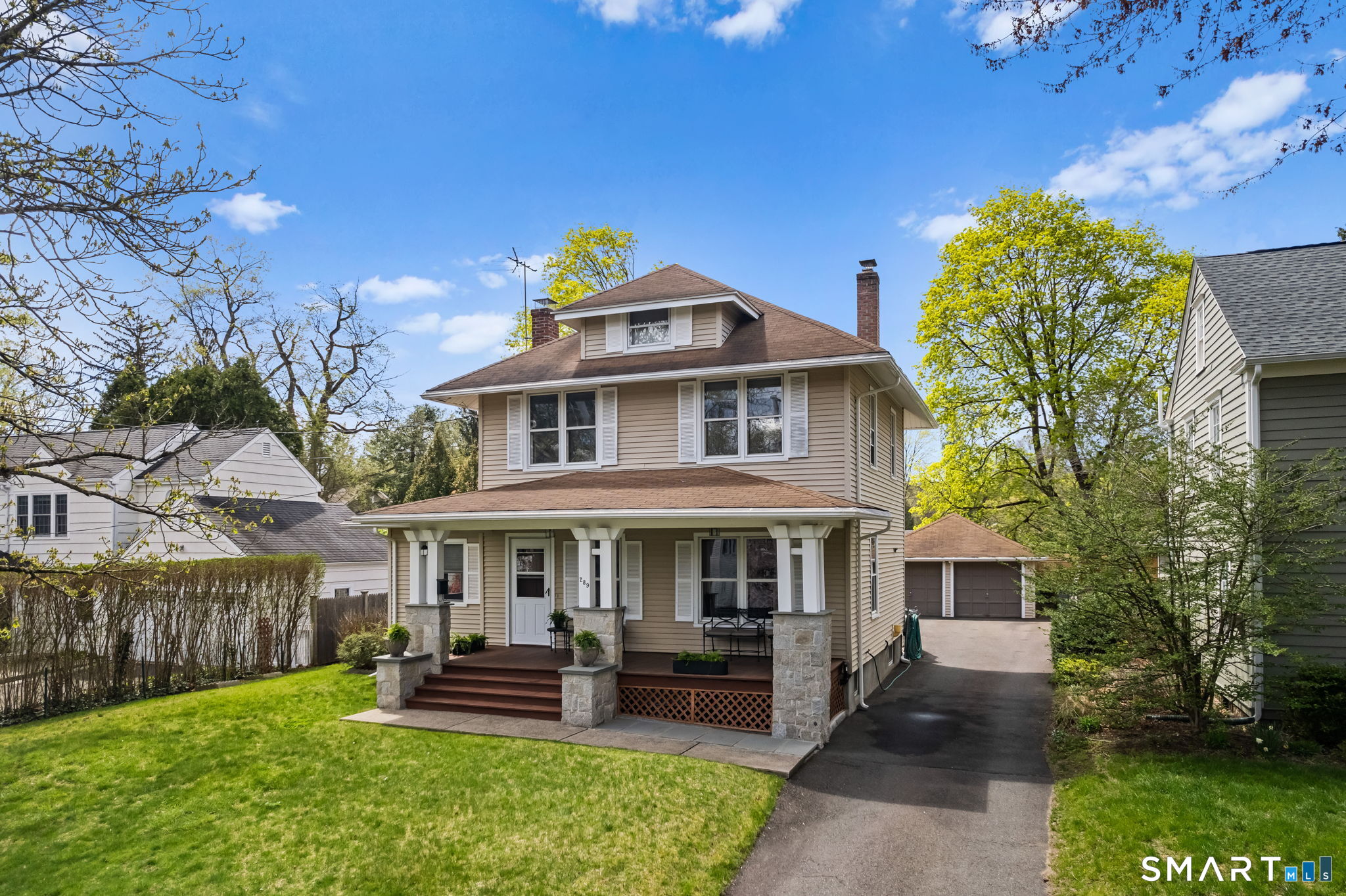 289 Old Mill Road Fairfield, CT 06824 - Photo 1 of 1 a front view of a house with a garden