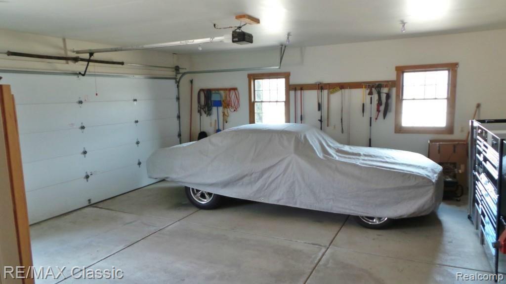 2447 North Hacker Road Howell, MI 48855 - Photo 45 of 62 2 1/2 car attached heated garage