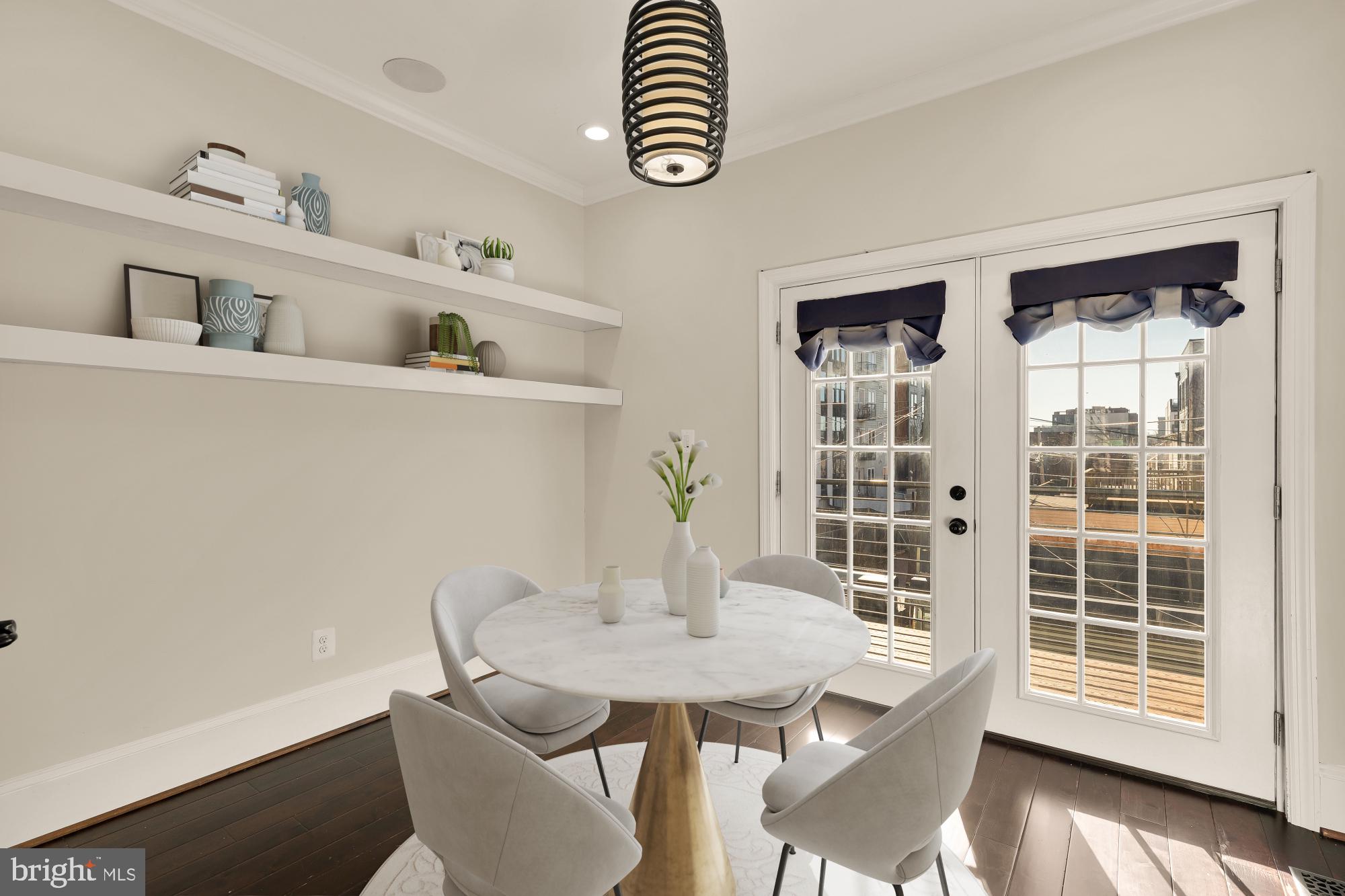 1609 Levis Street Northeast Washington, DC 20002 - Photo 9 of 35 a view of a dining room with furniture and wooden floor