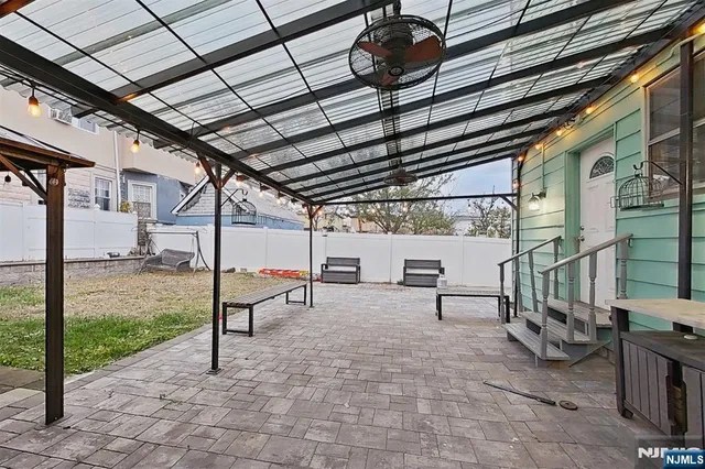 a view of a porch with furniture