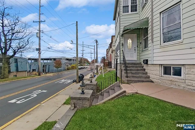 a view of a street with houses