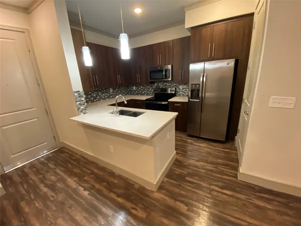 a utility room with washer and dryer