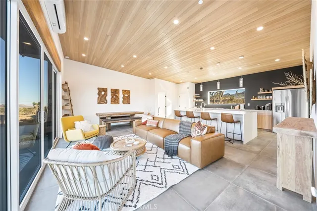 a kitchen with a stove and a refrigerator