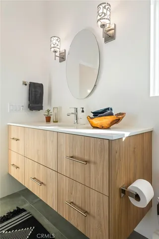 a outdoor space with a table and chairs