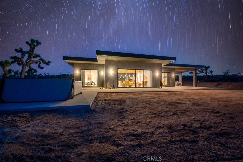 6737 Saddleback Road Joshua Tree, CA 92252 - Photo 64 of 65 a view of a room with lots of windows and a table