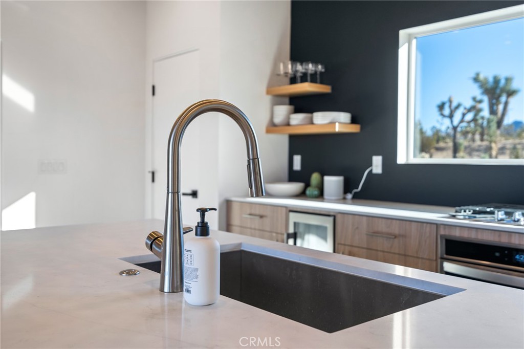 6737 Saddleback Road Joshua Tree, CA 92252 - Photo 9 of 65 a view of living room with furniture and wooden floor