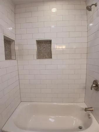 a bathroom with a bathtub