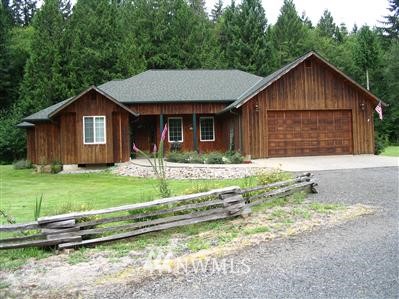 470 Yates Road Chehalis, WA 98532 - Photo 1 of 1 a front view of a house with a yard and garage