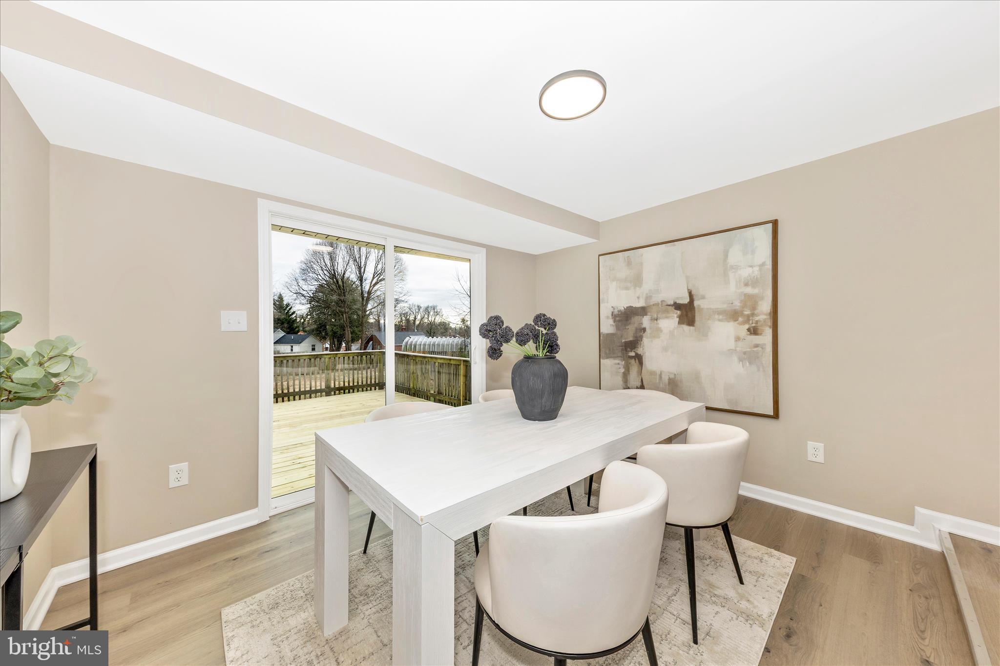 2506 Lindell Street Silver Spring, MD 20902 - Photo 11 of 47 a view of a dining room with furniture window and outside view
