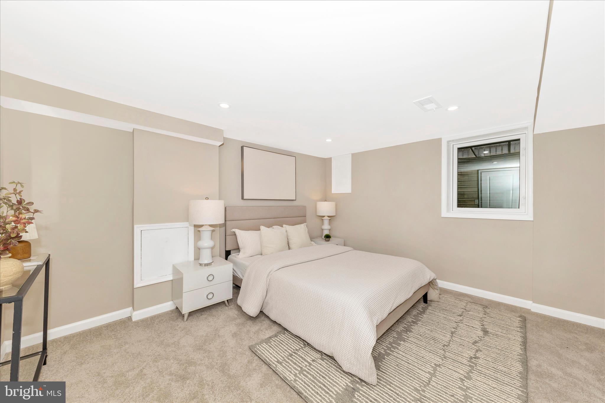 2506 Lindell Street Silver Spring, MD 20902 - Photo 15 of 47 a bedroom with a bed and a window