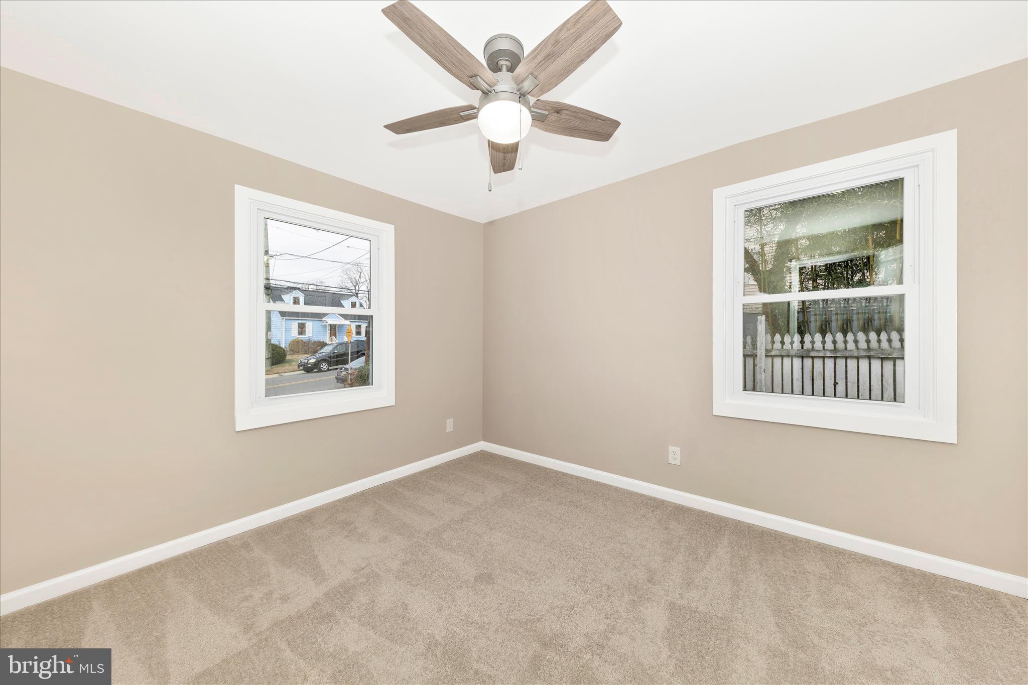 2506 Lindell Street Silver Spring, MD 20902 - Photo 17 of 47 an empty room with windows and fan