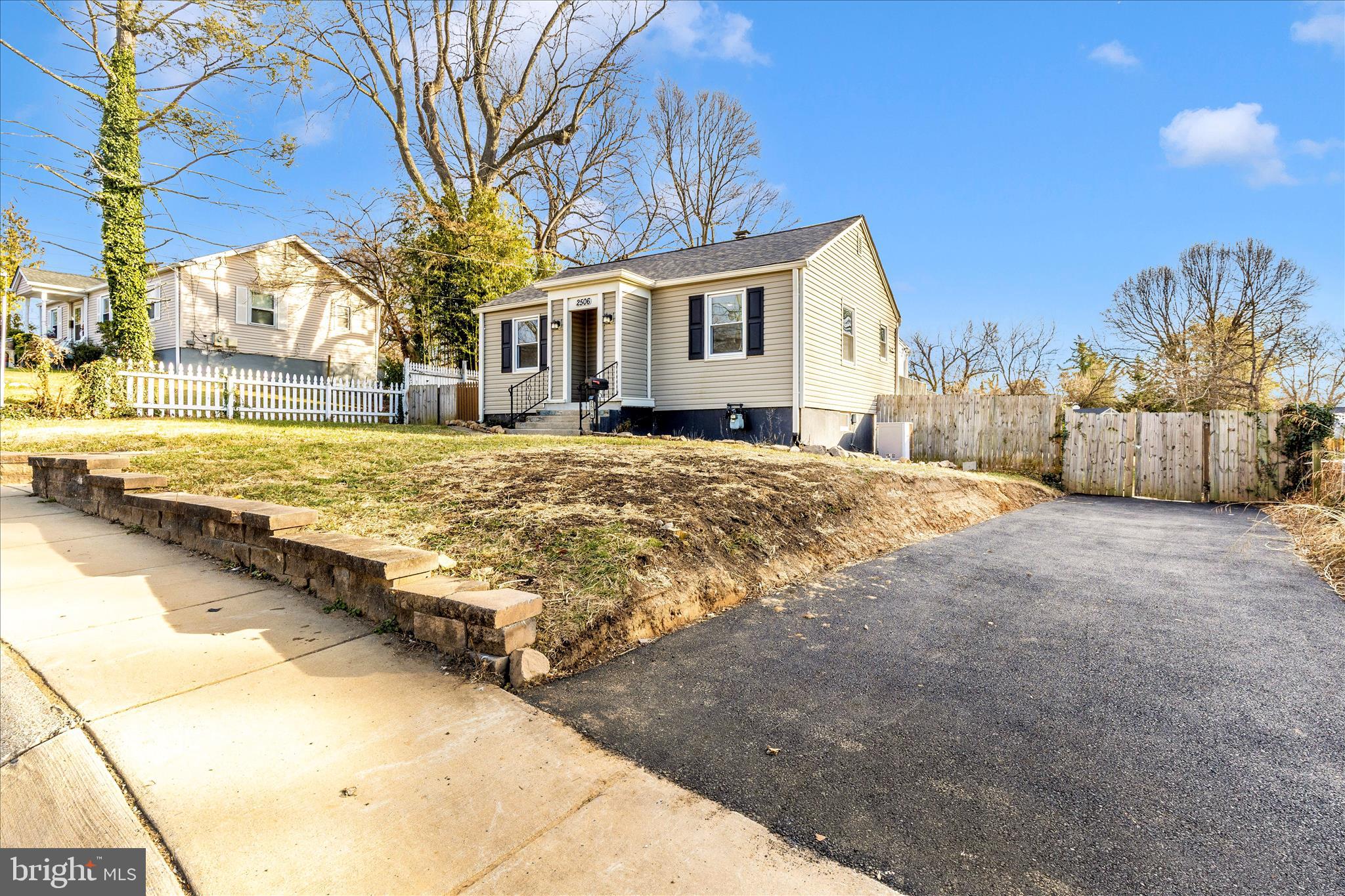 2506 Lindell Street Silver Spring, MD 20902 - Photo 2 of 47 a view of a house with snow on the road