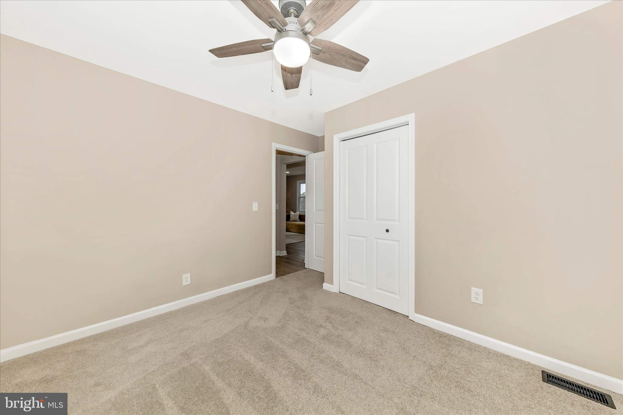 2506 Lindell Street Silver Spring, MD 20902 - Photo 23 of 47 an empty room with chandelier fan