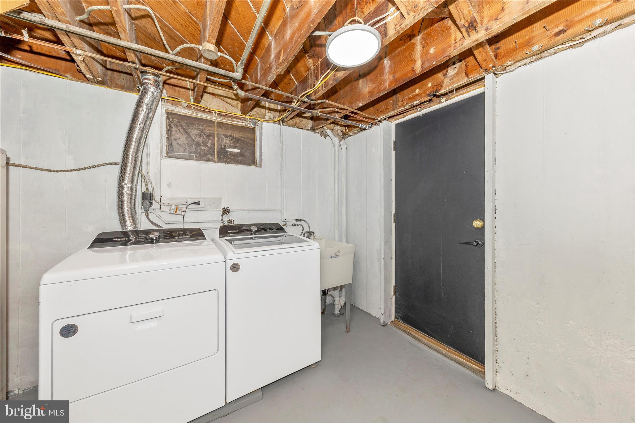 2506 Lindell Street Silver Spring, MD 20902 - Photo 34 of 47 a utility room with dryer and washer