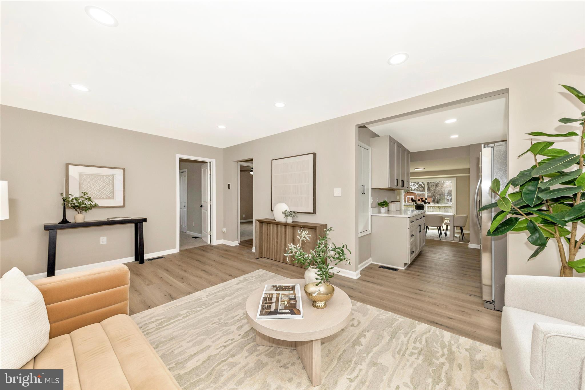 2506 Lindell Street Silver Spring, MD 20902 - Photo 6 of 47 a living room with furniture and a wooden floor