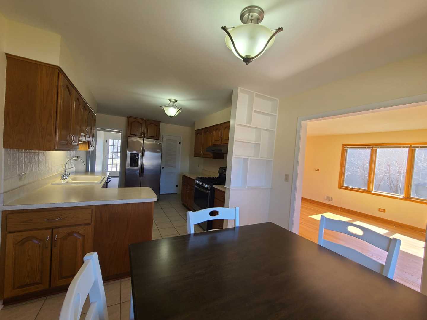 1441 Maple Street Glenview, IL 60025 - Photo 19 of 22 a living room with furniture pool table flat screen tv and windows