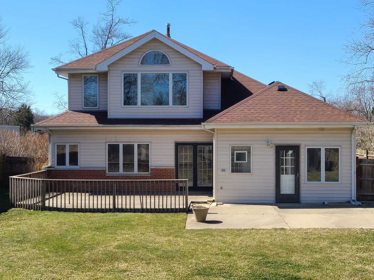 1441 Maple Street Glenview, IL 60025 - Photo 2 of 22 a front view of a house with a yard