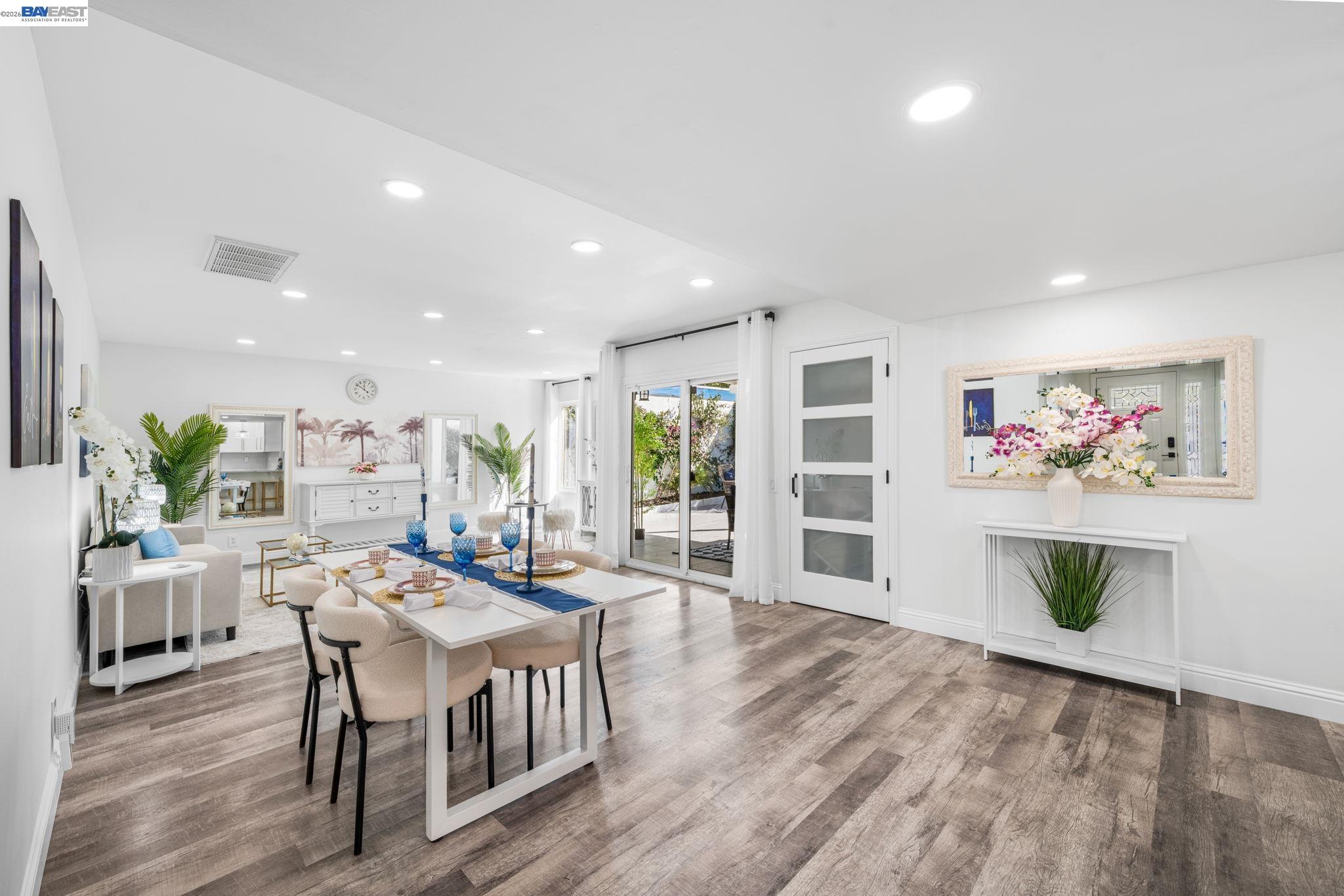 4019 Rennellwood Way Pleasanton, CA 94566 - Photo 19 of 48 a view of a dining room with furniture kitchen and wooden floor