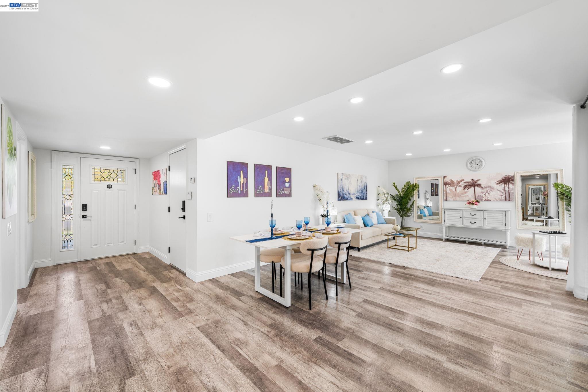 4019 Rennellwood Way Pleasanton, CA 94566 - Photo 20 of 48 a view of a living room and dining room
