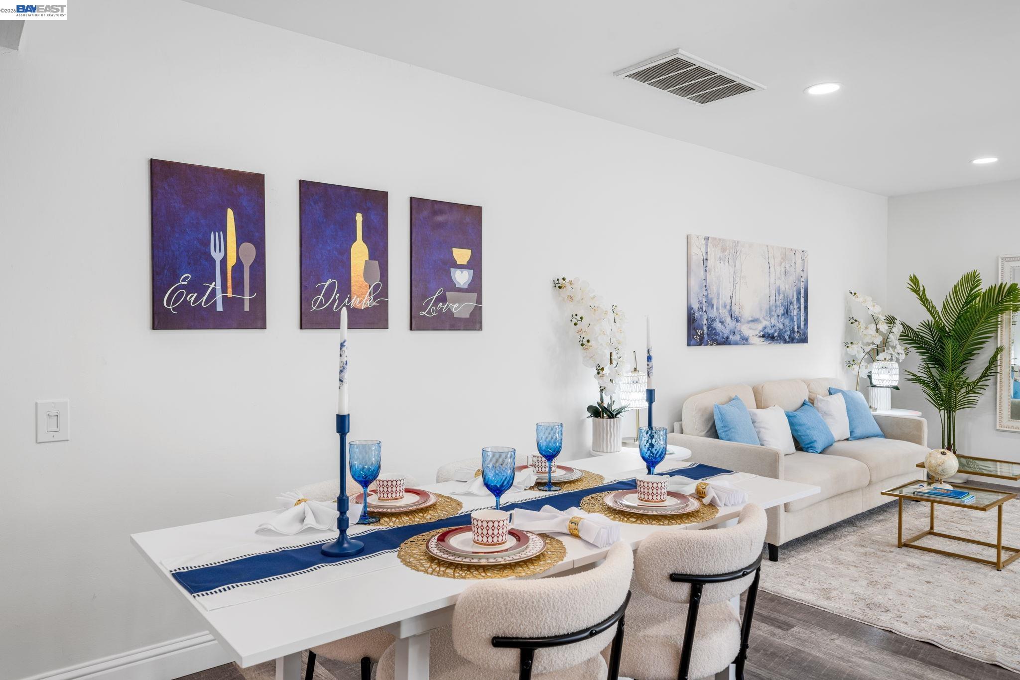 4019 Rennellwood Way Pleasanton, CA 94566 - Photo 21 of 48 a view of a dining room with furniture and wooden floor