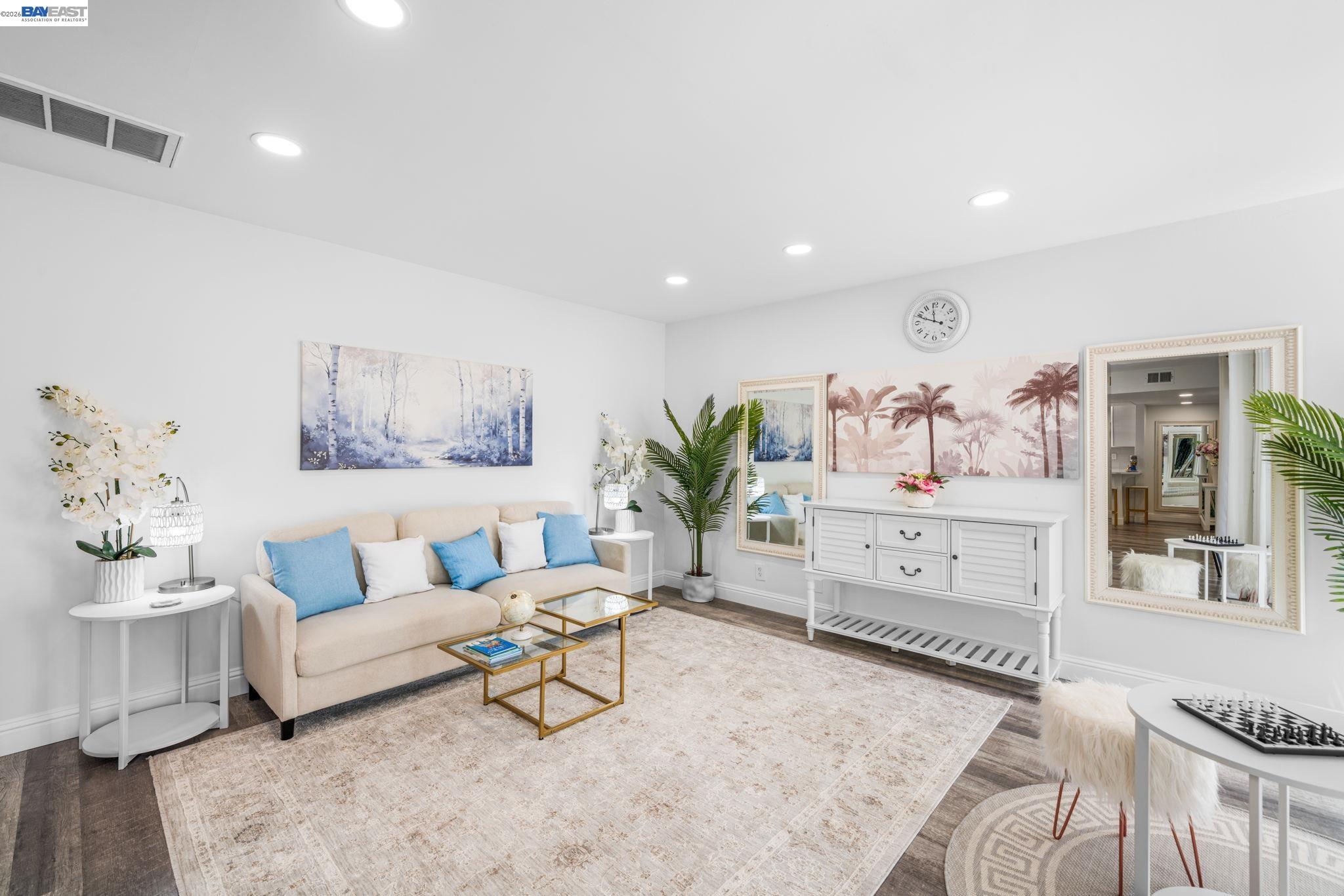 4019 Rennellwood Way Pleasanton, CA 94566 - Photo 22 of 48 a living room with furniture and a potted plant