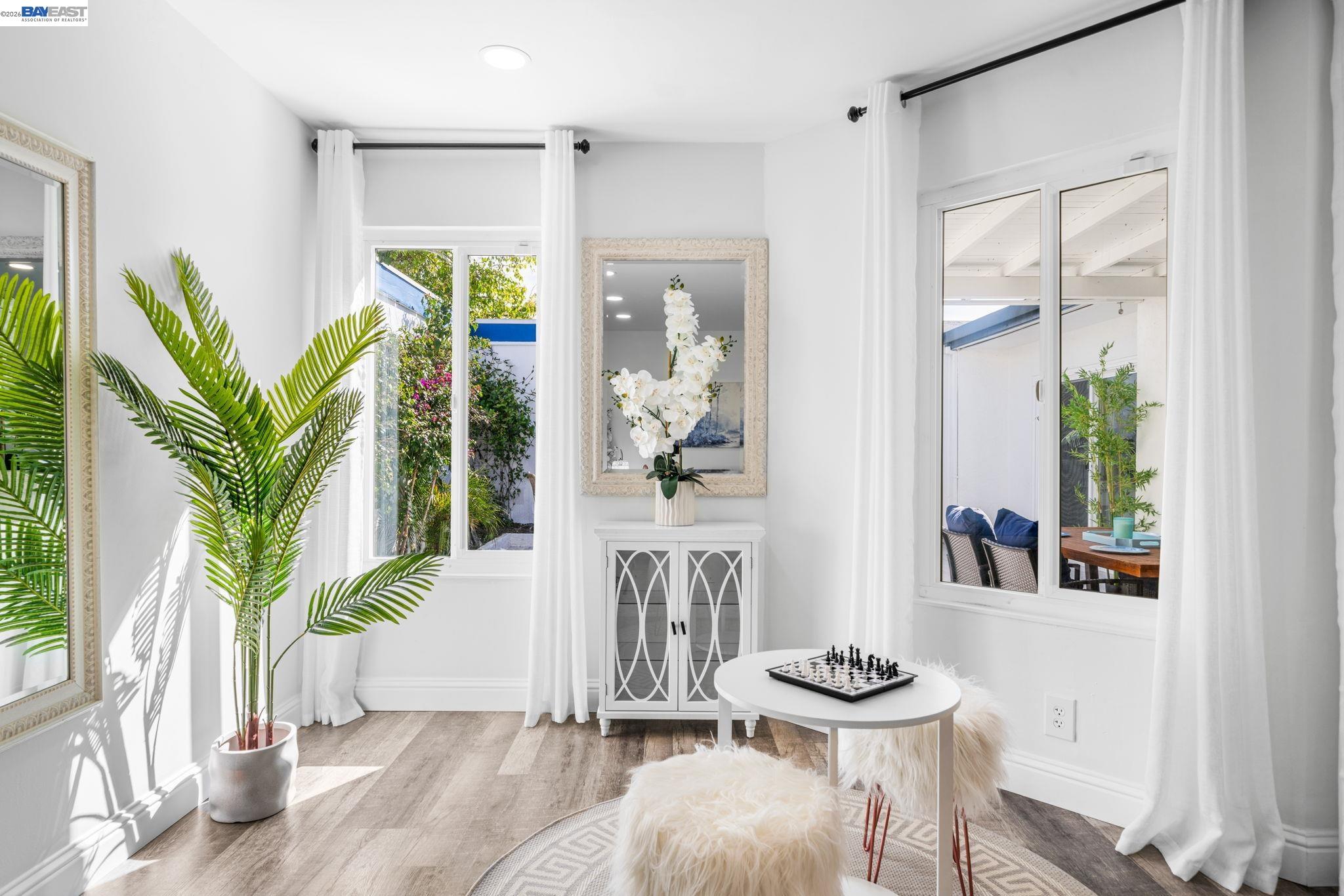 4019 Rennellwood Way Pleasanton, CA 94566 - Photo 26 of 48 a living room with furniture and a potted plant