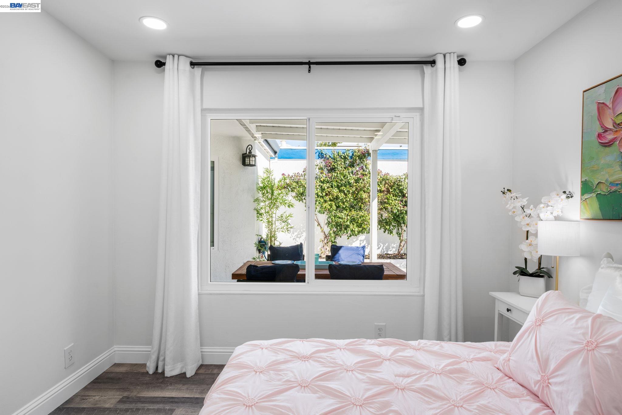 4019 Rennellwood Way Pleasanton, CA 94566 - Photo 34 of 48 a bedroom with a bed and a window