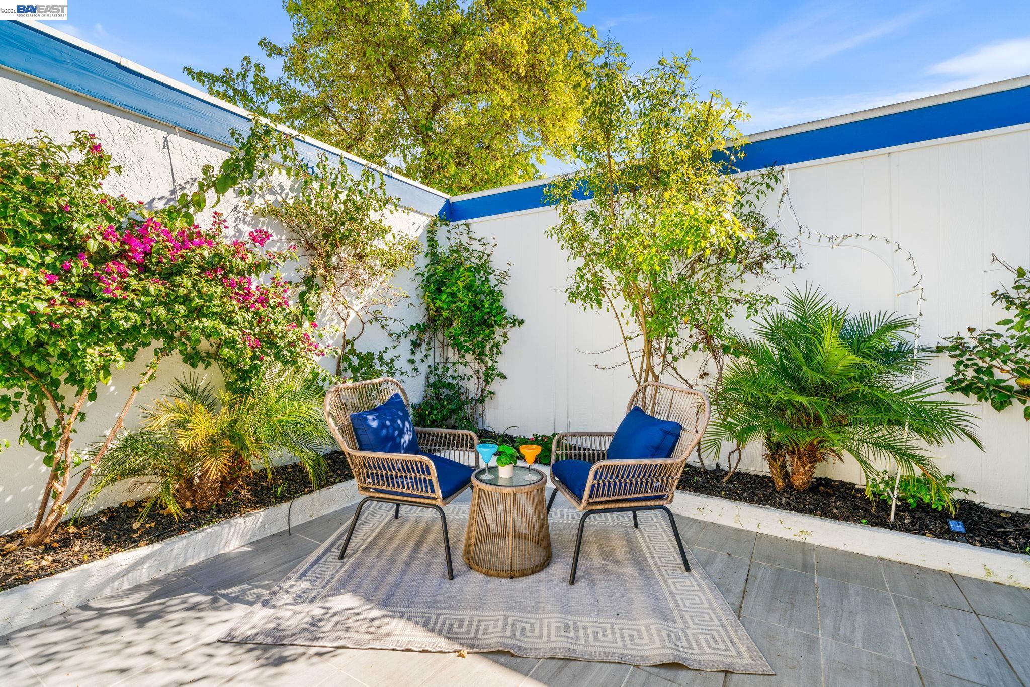 4019 Rennellwood Way Pleasanton, CA 94566 - Photo 38 of 48 a view of a chairs and table in the patio