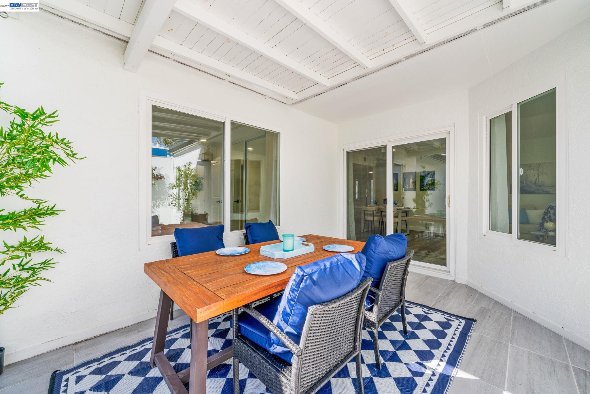 4019 Rennellwood Way Pleasanton, CA 94566 - Photo 39 of 48 a view of a dining room with furniture window and wooden floor