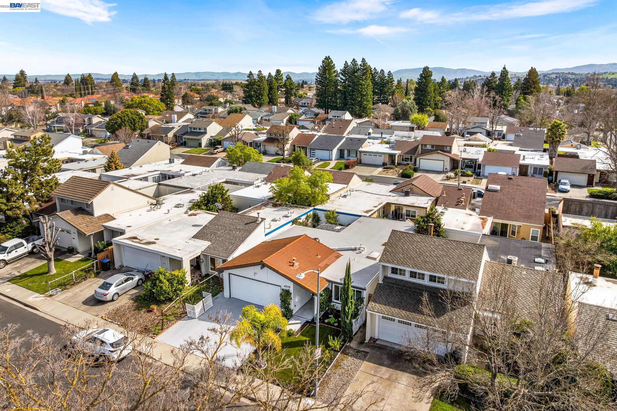 4019 Rennellwood Way Pleasanton, CA 94566 - Photo 45 of 48 an aerial view of a city with lots of residential buildings