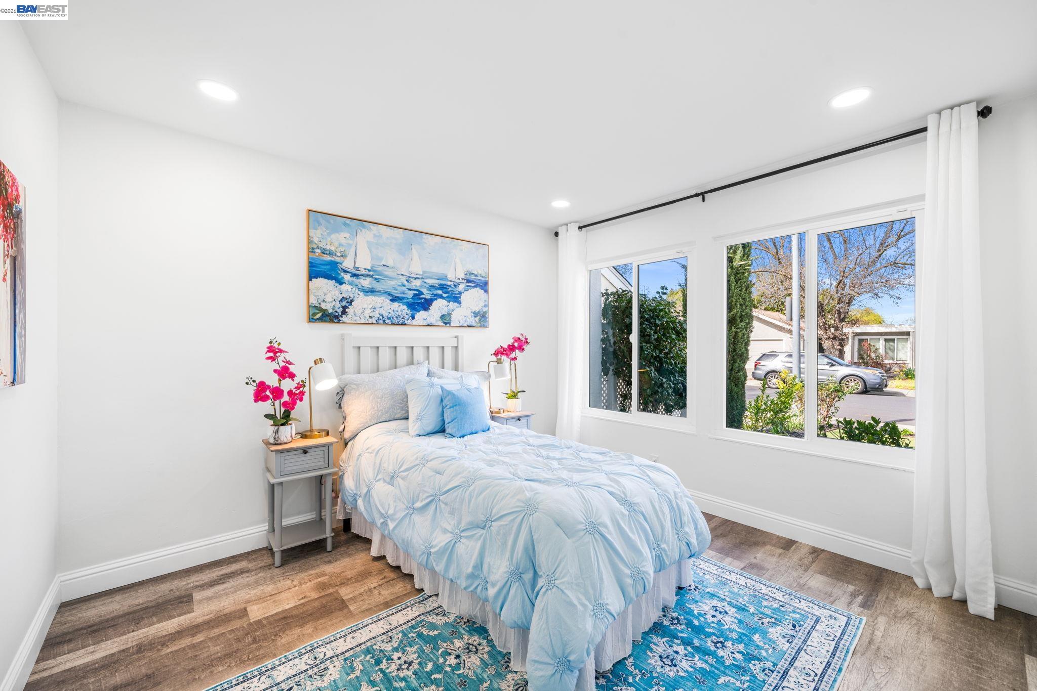 4019 Rennellwood Way Pleasanton, CA 94566 - Photo 10 of 48 a bedroom with a bed and a window