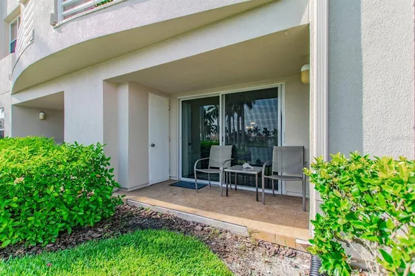a view of bench in front of house