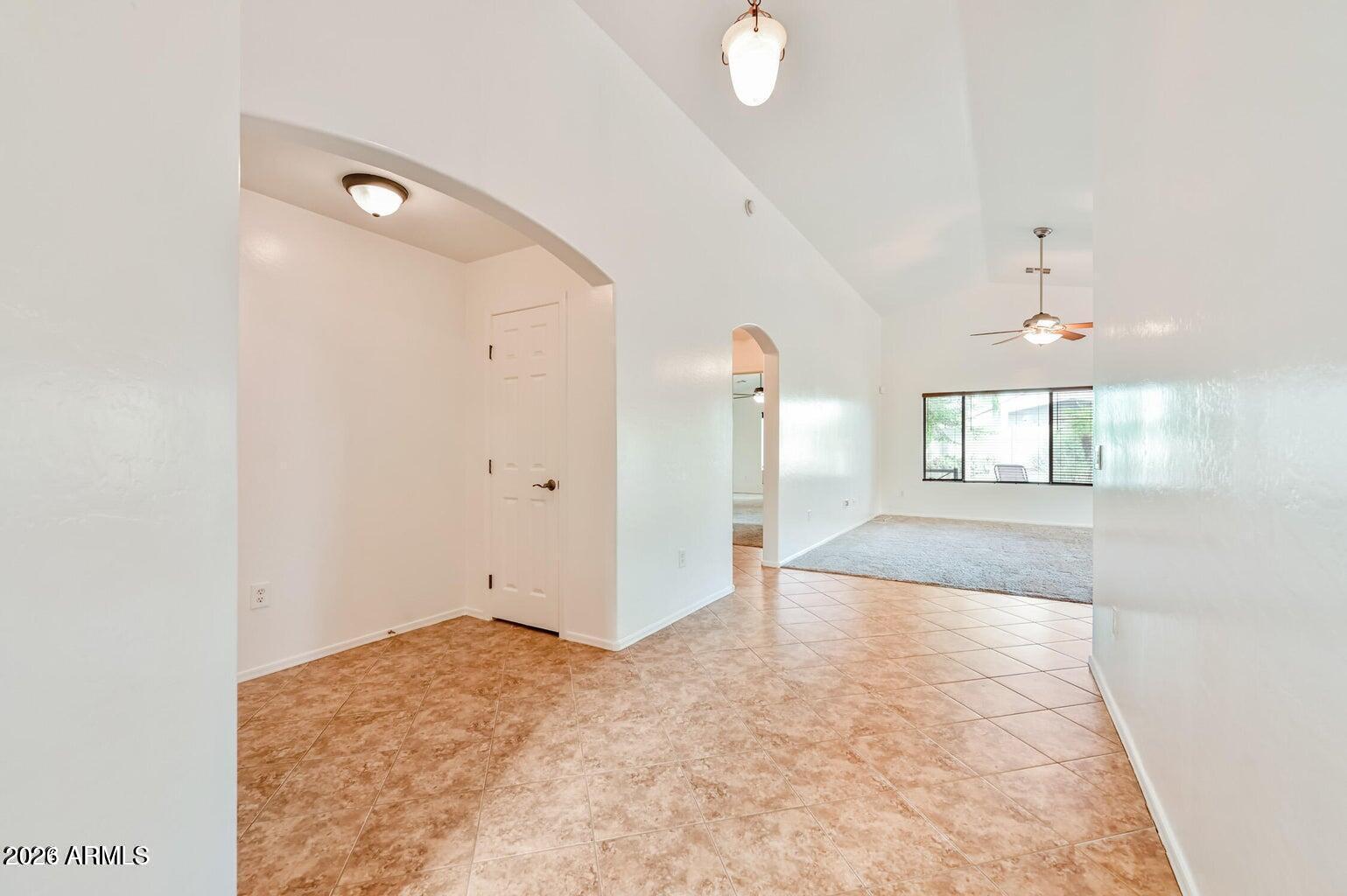 7809 South 20th Lane Phoenix, AZ 85041 - Photo 6 of 31 a view of a livingroom with wooden floor