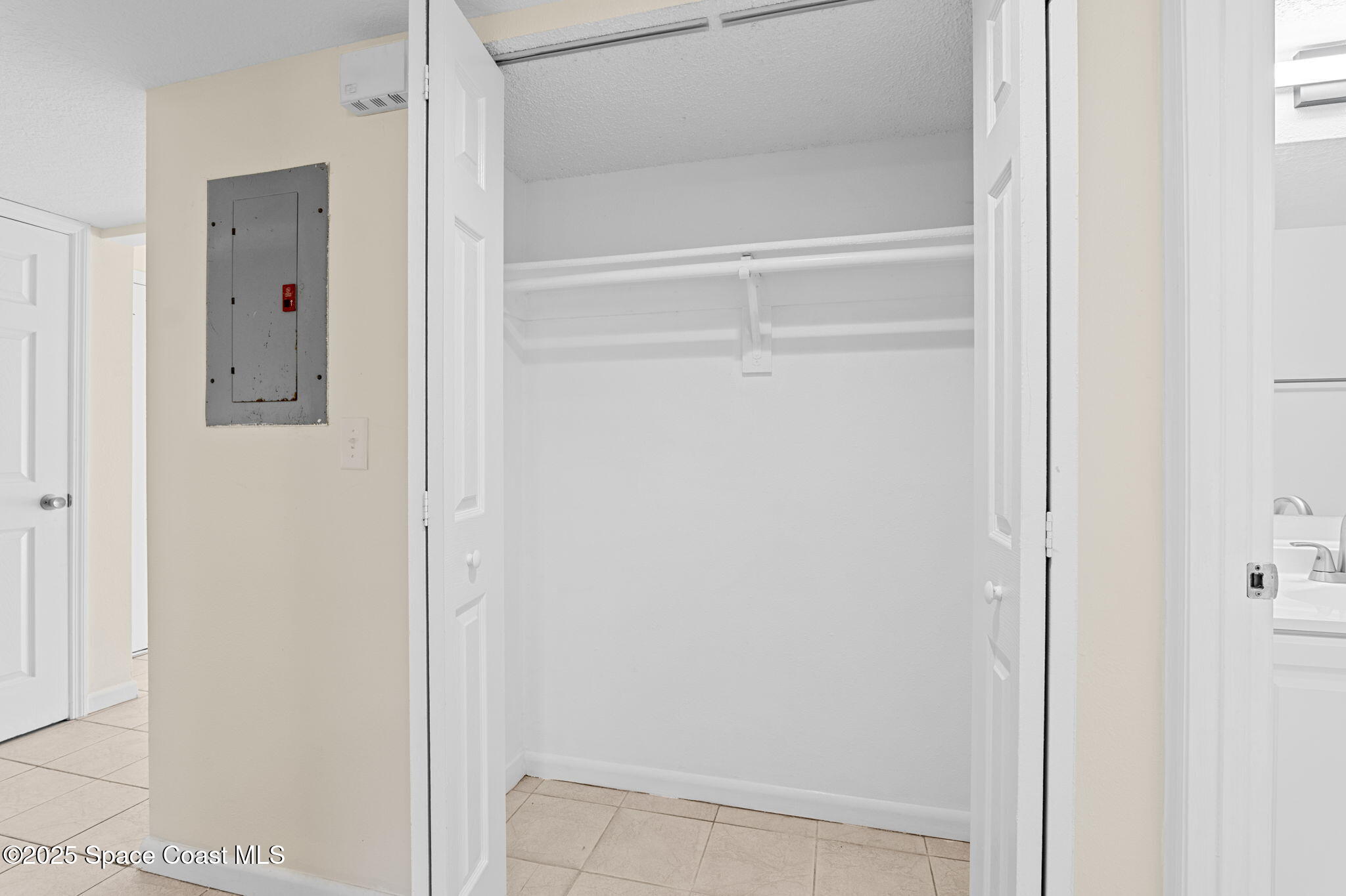 1884 Agora Circle Southeast, Unit 101 Palm Bay, FL 32909 - Photo 11 of 18 a view of walk in closet