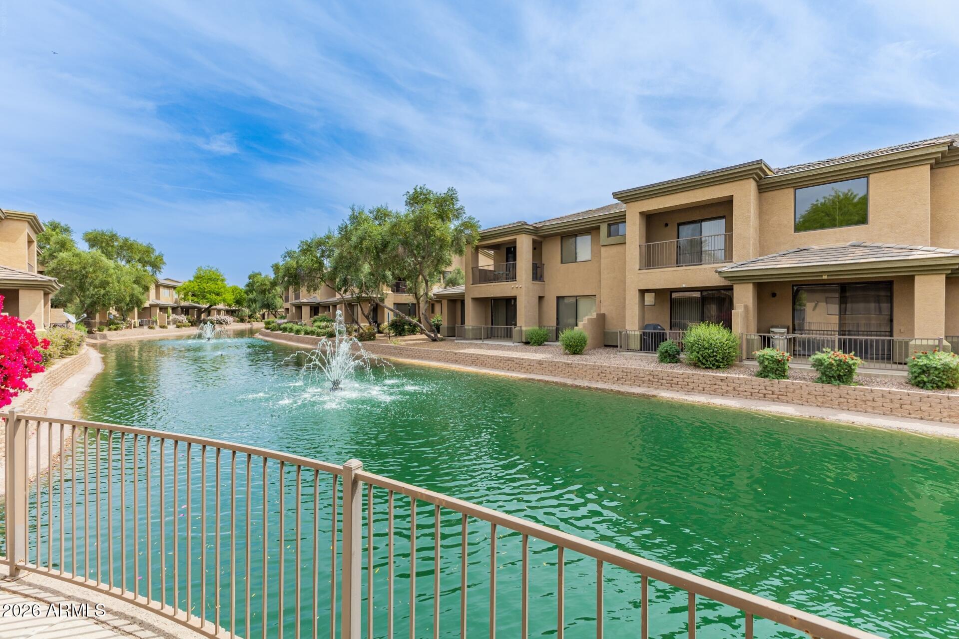 705 West Queen Creek Road, Unit 1167 Chandler, AZ 85248 - Photo 29 of 31 a view of a house with a yard