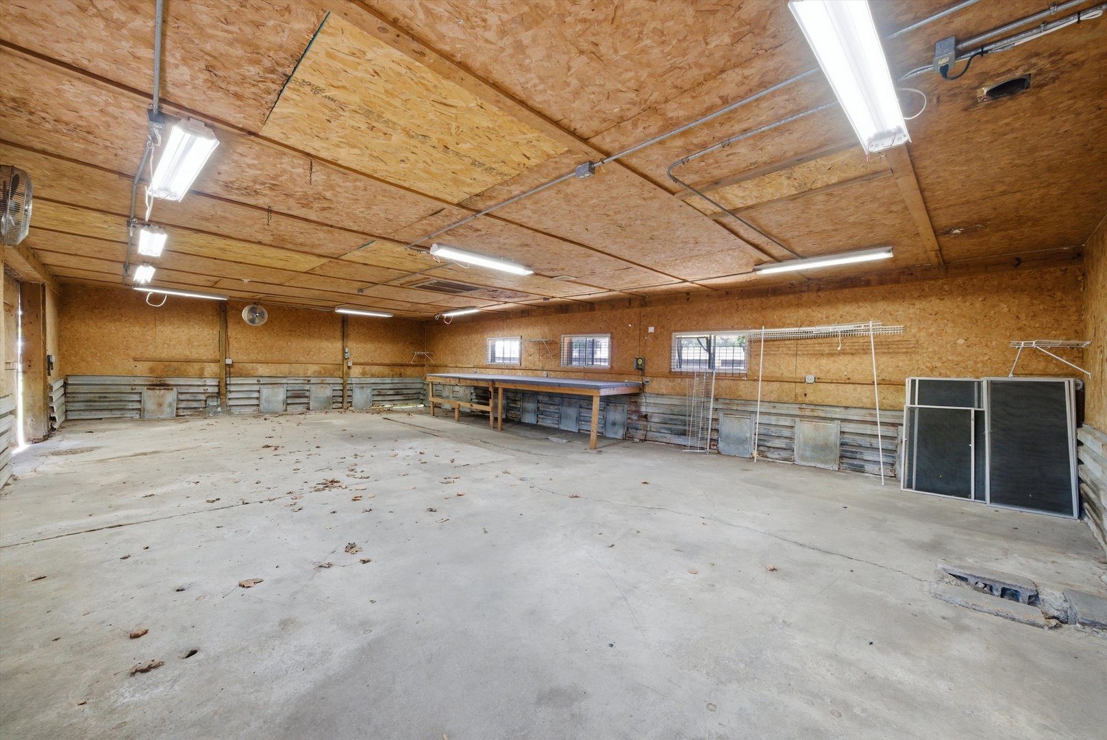 2304 Plainfield Road Crest Hill, IL 60403 - Photo 32 of 56 a view of a empty room with wooden roof
