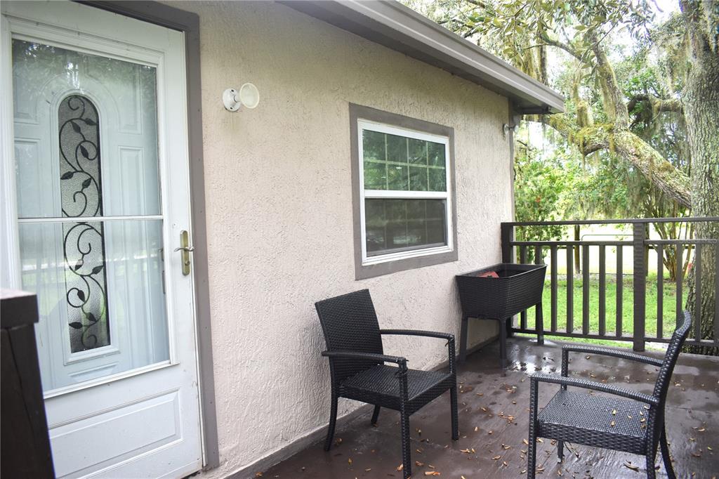 15355 Southwest 85th Avenue Dunnellon, FL 34432 - Photo 19 of 23 a living room with furniture and a window