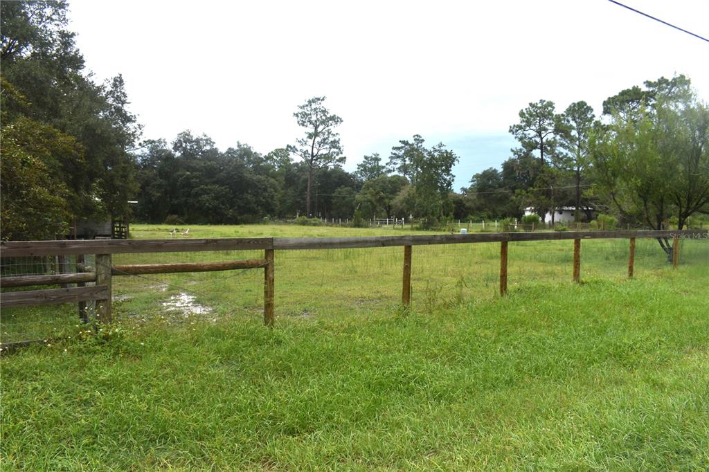15355 Southwest 85th Avenue Dunnellon, FL 34432 - Photo 20 of 23 a view of a golf course with a lake view