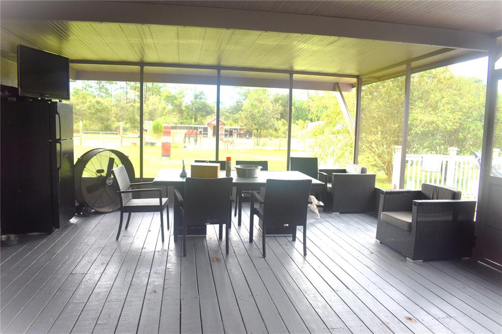 15355 Southwest 85th Avenue Dunnellon, FL 34432 - Photo 8 of 23 a view of a dining room with furniture window and wooden floor