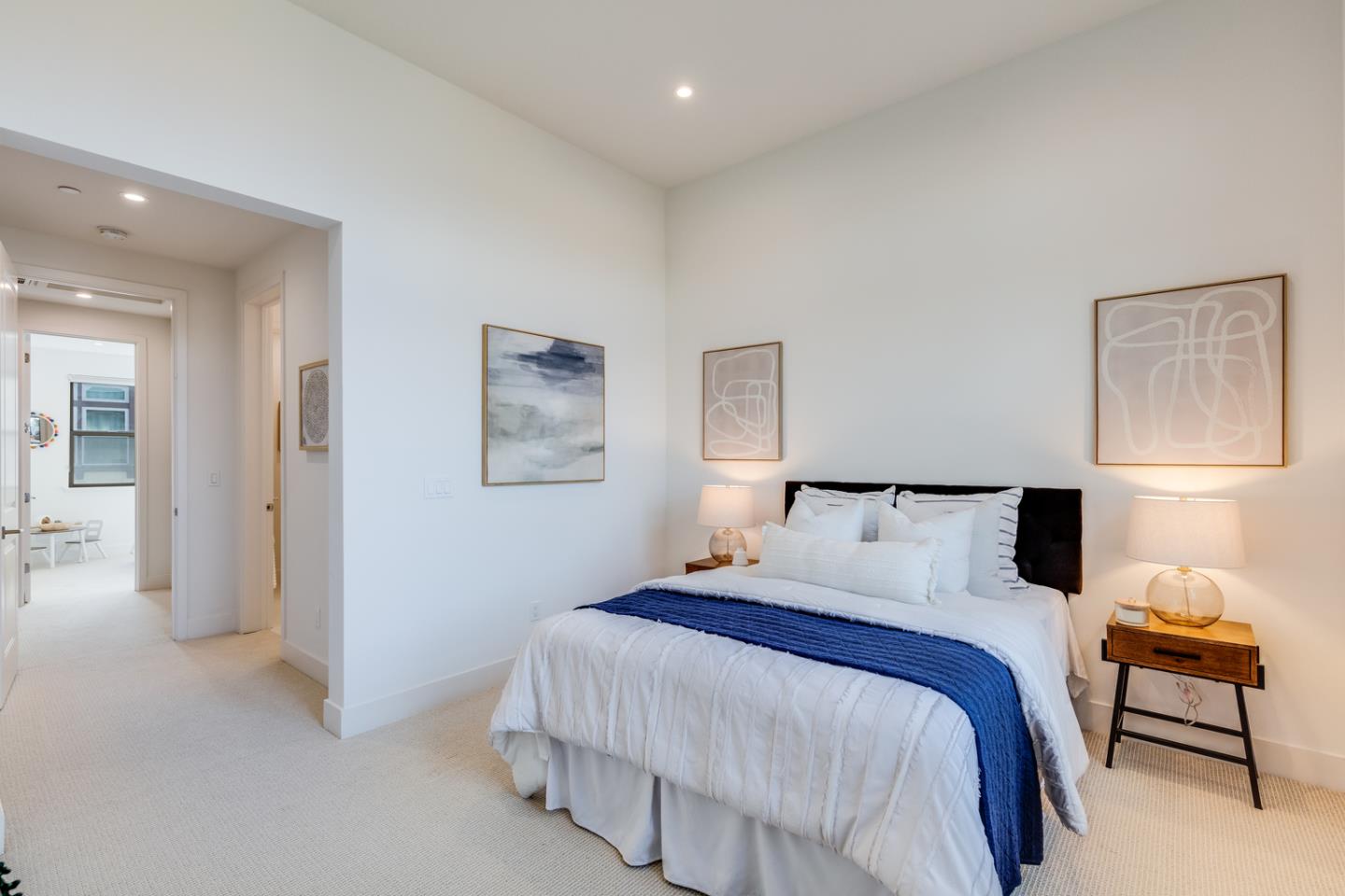 309 Marquetta Circle Mountain View, CA 94043 - Photo 16 of 34 a bedroom with a bed and a lamp