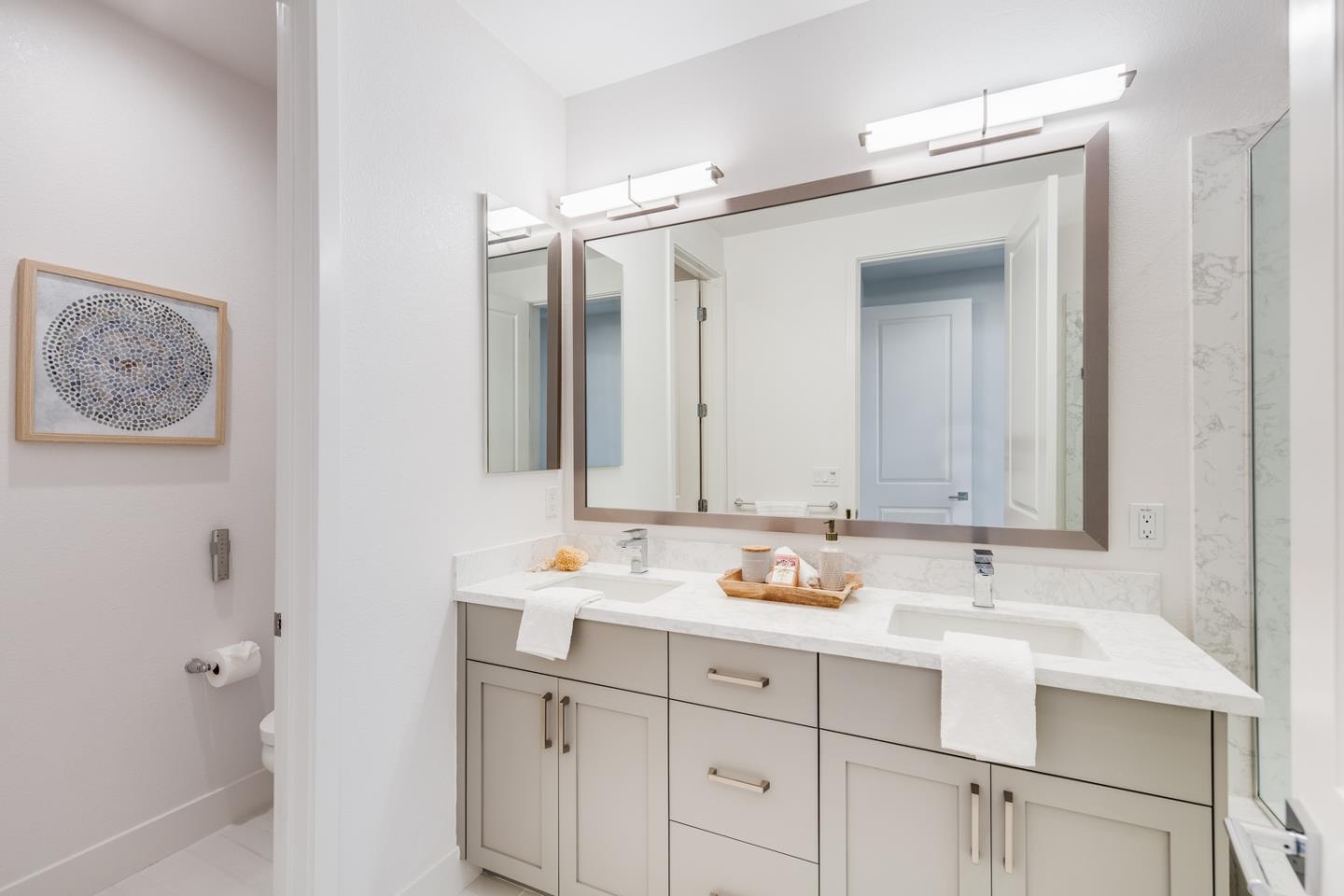 309 Marquetta Circle Mountain View, CA 94043 - Photo 18 of 34 a bathroom with a sink and a mirror